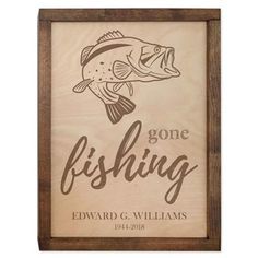 a wooden sign that says gone fishing with a fish on the front and bottom corner