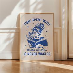 a poster on the floor reads time spent with books and cats is never wasted