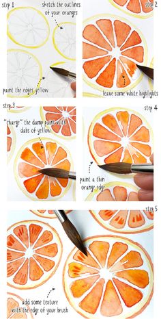 an orange cut in half and being used to paint the inside of it with watercolors