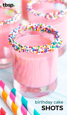 pink birthday cake shots with sprinkles in glasses