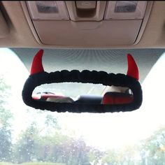 the interior of a car with horns on it