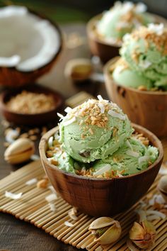 two wooden bowls filled with green ice cream