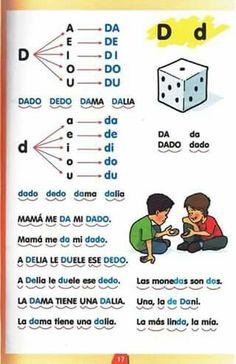 a book with spanish words and pictures on the pages, including dices and numbers