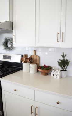 the kitchen counter is clean and ready to be used as a christmas centerpieces