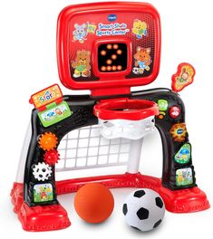 the electronic soccer game is on display with its ball and net in front of it