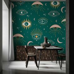 a dining room wallpaper with an eye design