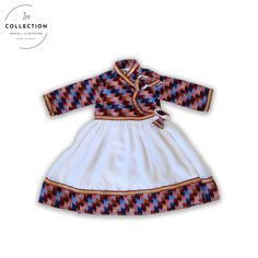 Introducing our enchanting Nepali Dhaka Dress/Fusion Dress specially designed for your little princesses! Embrace cultural elegance and contemporary charm with this beautifully crafted ensemble, perfect for baby girls. Inspired by the rich heritage of Nepal, this fusion dress seamlessly blends traditional Dhaka fabric with modern design, resulting in a stunning outfit that exudes grace and uniqueness. The vibrant colors and intricate patterns of Dhaka textiles add a touch of cultural flair, while the gown's silhouette ensures comfort and ease for your little one to move and play freely. Nepali Traditional Dress, Nepali Traditional, Traditional Baby Dresses, Gurung Dress, Fusion Dress, Dress For Baby, Ethnic Dress, Stunning Outfits, Traditional Dress