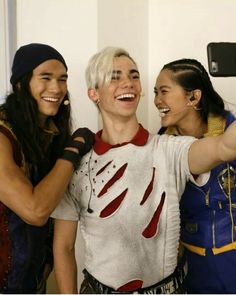 three people are taking a selfie together