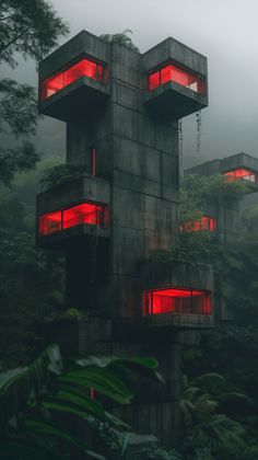 a building with red lights on it in the middle of trees