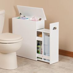 a white toilet sitting in a bathroom next to a cabinet filled with bottles and other items