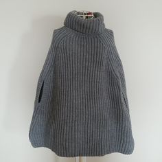 New Grey Poncho/Cape Sweater Winter Chunky Knit Tops For Work, Chunky Knit Top For Winter Workwear, Cozy Knit Stretch Outerwear, Cozy Stretch Knit Outerwear, Cozy Knit Outerwear With Funnel Neck, Cozy Knit Funnel Neck Outerwear, Stretch Chunky Knit Outerwear For Winter, Cozy Chunky Knit Workwear Tops, Fitted Chunky Knit Wool Outerwear