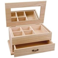 an open wooden jewelry box with compartments on the bottom and inside, sitting against a white background