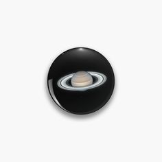 an object that looks like saturn on a white background