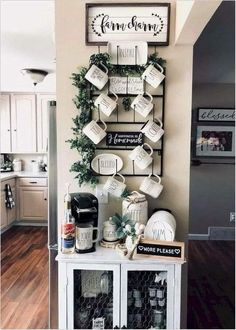 a shelf with plates and mugs on top of it in the corner of a room