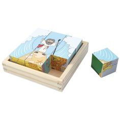 a wooden box with an image of a man on a boat in the water, and two matching blocks