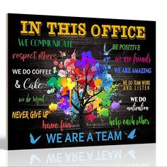 a colorful tree with the words in this office painted on it's black background