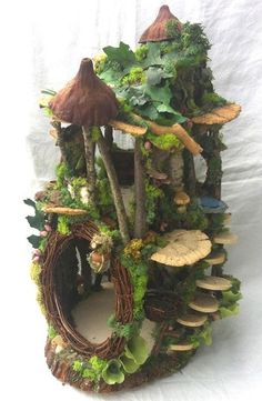 a house made out of plants and mushrooms