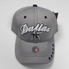 a baseball cap with the word dallas on it