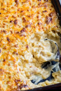 a casserole dish with macaroni and cheese in it, ready to be eaten