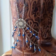 One Of A Kind Handmade Royal Blue Glass Bead Boot Jewelry Boot Bracelet Boot Chain This Exact Piece Was Awarded A Blue Ribbon From The State Fair Of Texas In 2023! Very Simple Design The Top Chains Secure Behind The Pull With A Lobster Clasp! Jewelry Won't Move Around Or Accidentally Be Stepped On, I Designed These To Be Worn Even While Dancing! This Is A Very Unique Piece Of Boot Jewelry! The Focal Point Of This Bootlery Is An Incredibly Ornate, Tibetan Style Earring Component, Boasting 2 Chain Western Boot Jewelry, Western Accessories Women, Blue Beaded Bracelets With Silver Beads For Festivals, Blue Nickel-free Beaded Bracelets For Festivals, Blue Beaded Jewelry, Western Jewerly, State Fair Of Texas, Boot Charms, Glass Bead Jewelry