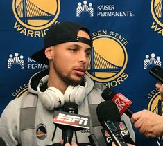 the golden state warriors'stephen curry talks to reporters at a press conference in san francisco, california