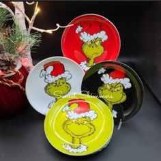 the grin face plates have been decorated with santa's hats