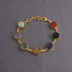 "18K Gold Vermeil Bracelet, Multi Colored Stone Bracelet, Designer Bracelet, Raw Crystal Bracelet, Adjustable Bracelet, Holiday Gift Jewelry Product Details Item Code: BJBB-1557 Stone Name: Carnelian, Black Tourmaline, Amethyst, Citrine, Fluorite, Rose Quartz And Aquamarine  Stone Size: 10mm Metal: 18K Yellow Gold Plated Over Brass Bracelet diameter : 7.50\" Inch - Adjustable Note :- This bracelets you will receive may vary slightly in color from the images because these are natural gemstones and vary to each other every single time and it is not possible to get the same color what is showing in the images. Images are for reference to get an idea of the similar color you will get. Shipping Info: All my items are safely and nicely packaged and shipped in a beautiful plastic box with bubbles Gem Stone Bracelet Jewelry, Single Stone Bracelet, Colored Stone Jewelry, Gemstone Bracelet Designs, Gem Stone Jewelry Design, Gem Bracelets Stones, Gold Bracelet With Stones, Natural Stone Bracelet Ideas, Crystal Bracelets Aesthetic