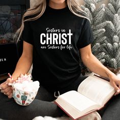 This Sisters in Christ t-shirt is the perfect gift for women of faith. There is nothing more special than the fellowship and friendship of Sisters in Christ. Whether it's a friend from small groups at church, a family member, or a bestie you've known forever, the support and encouragement from Sisters in Christ is truly a blessing and special bond. Sisters in Christ are Sisters for life. This t-shirt is perfect for a women's retreat, casual coffee with the ladies or school activities. It's soft, Sisters In Christ Gifts, Papa Jesus, Christian Christmas Gift, Christian Hats, Women's Retreat, Creative T Shirt Design, Womens Retreat, Faith Clothing, Creative T Shirt