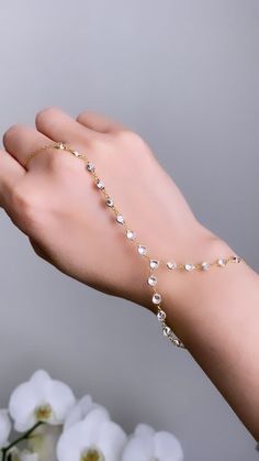 "Valentines Day Gift İdeas, Birthday and Anniversary Gift İdeas For Woman, Gift For Bestfriend, Crystal Hand Chain Bracelet Chain, Hand Chain Ring Bracelet Jewelry, Cubic Zirconia Bracelet Dainty, Birthday Gifts For Woman, Gift For Mom Give your loved one a special touch on Mother's Day! These unique chain bracelets, meticulously crafted with 925 sterling silver and elegant natural stones, are the perfect way to enchant your beloved with sophistication and grace. Silver and natural stones symbol Chain Ring Bracelet, Hand Chain Bracelet, Ring Bracelet Chain, Cubic Zirconia Bracelet, Bracelet Dainty, Sanya, Chain Bracelets, Bracelet Chain, Hand Chain