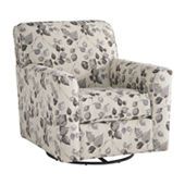 the chair is upholstered with flowers and has a black metal base on it