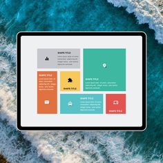 an aerial view of the ocean with waves crashing on it and a tablet screen displaying different colors