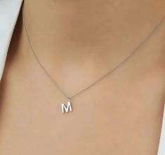 14K SOLID YELLOW GOLD DAINTY INITIAL NECKLACE Necklace Length : 16 inches Letter Height : 8.50mmLetter Width : 6.55mm---MADE IN USA------All letters from A to Z are available. Please indicate your letter choice in the "notes to seller" section on the order.---This is a beautiful 14K Solid White Gold Dainty Initial Necklace. Available White Gold -Yellow Gold or Rose Gold Small Initial Necklace, Letter M Necklace, Star Wedding Band, Handmade Wedding Band, M Necklace, Gold Initial Necklace, Dainty Initial Necklace, Plain Wedding Band, Initial Necklace Gold