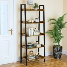 a book shelf with books and plants on it next to a potted palm tree