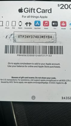 an apple gift card is displayed on the back of a car seat for $ 200