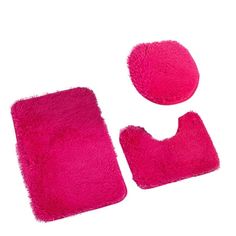 two pink rugs and one pair of slippers on a white background with space for text