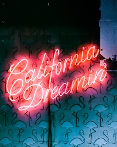 a neon sign that reads california dreaming