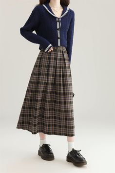 Pleated plaid midi skirt in cozy colors to go with your autumnal fits. Features an elastic waist back. Lined. One Size: 26"-36" waist, 31" length Plaid Midi Skirt For Fall, Plaid Midi Skirt Casual Style, Casual Plaid Midi Skirt, Casual Full Pleated Skirt For Winter, Fall Plaid Relaxed Fit Skirt, Plaid Lined Skirt For Winter, Plaid Relaxed Fit Skirt For Fall, Casual Plaid Skirt For Fall, Relaxed Plaid Skirt For Fall