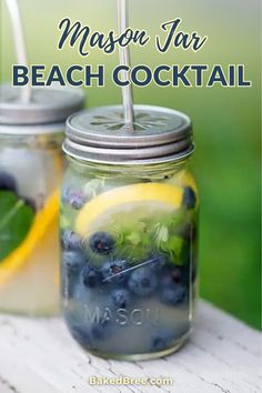 mason jar beach cocktail with lemon and blueberries