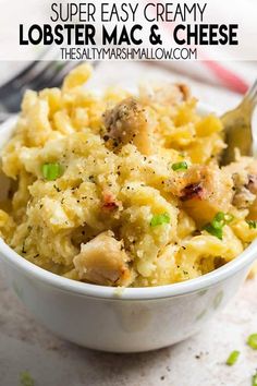 a bowl filled with macaroni and cheese on top of a table