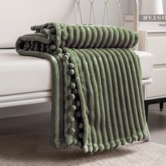 PRICES MAY VARY. 【Pompom & Strip Design】- Flannel fabric with pompoms fringe around the blanket, different color and white stripe pattern with 3D touching offers you amazing senses of softness. The fabulous color revives this blanket with an elegant appearance to complement your room a chic feeling. 【Soft & Lightweight】- The throw we offered is designed to be simple but elegant, this plush throw is super soft, warm and lightweight. Fleece bed blanket brings you more breathable and lightweight fe Green Throw Blanket, Green Blanket, Afghan Throw Blanket, Green Throw, Microfiber Blanket, Twin Blanket, Knit Throw Blanket, Couch Throws, Blanket Throw