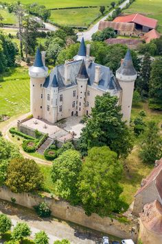 an aerial view of a castle in the countryside