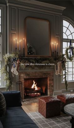 a living room filled with furniture and a fire place