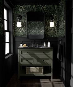 a bathroom with green wallpaper and black walls