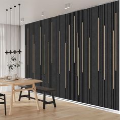 a dining room with black and white wallpaper, wooden table and chairs in front of it