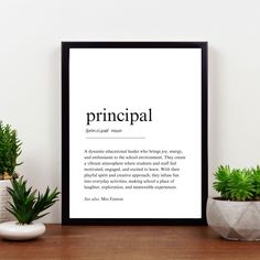 a black and white print with the words principals on it next to potted plants