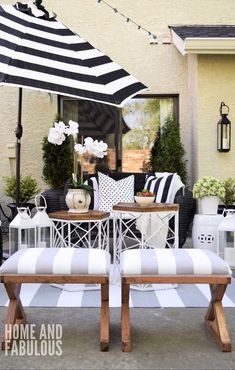 an outdoor patio decorated with black and white striped furniture