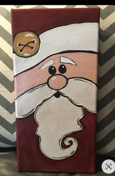 a painting of a santa clause on a canvas