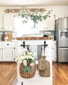 the instagram page on instagram com shows an image of a kitchen with white cabinets and