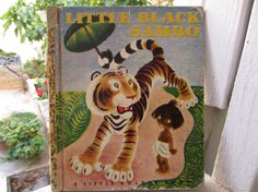 a little black sambo book sitting on top of a table