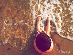 a person laying on the beach with their feet in the water and text that reads, summer time